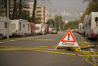Circus Sign and Many Caravan on the Street in Locarno