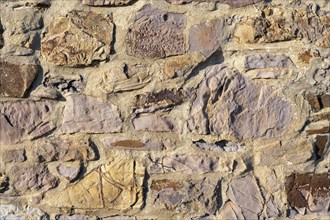 Wall stones of different types of stone