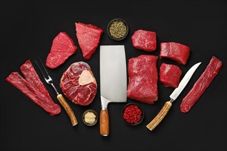 Top view of assortment of fresh raw beef meat steaks