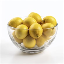 Bowl of lemon against white background