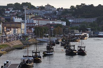 Historic boats transporting casks of port wine on the Douro River