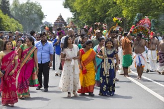 Hindus in traditional dress on the main festival day at the big parade Theer