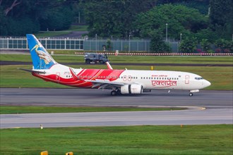 An Air India Express Boeing 737-800 aircraft with registration VT-AXT at Changi Airport