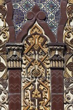 Ceramic tiles facade with faces