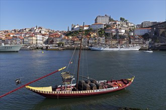 Historic boat with port wine barrels on the Douro River