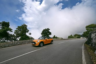 Mini Cooper Convertible on the Ma10 road in the Tramuntana Mountains