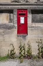 Royal Mail letterbox integrated into a house wall
