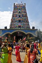 Hindus on the main festival day at the temple festival in front of the Hindu temple Sri Kamadchi Ampal