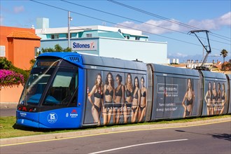 Modern tramway Alstom Citadis 302 line L1 at the stop Gracia with Intimissimi advertising Public transport in Tenerife