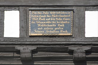 Inscription and text about Johann Sebastian Bach's family history on the historic Bach ancestral home