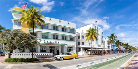 Avalon Hotel Art Deco Style Architecture and Vintage Car Panorama on Ocean Drive in Miami Beach