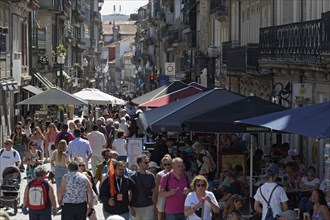 Pedestrian street Rua das Flores with crowds of tourists