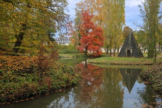 Pyramid at the pond during autumn with reflection