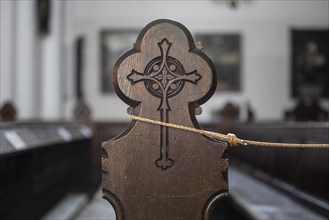 A bench in St. Mary's Church is locked down to maintain the minimum distance