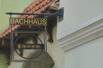 Nose plate with musical notes and inscription Bachhaus