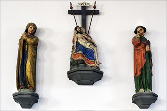 Pieta and two figures of saints