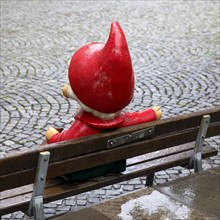Sculpture of the Sandman on a bench