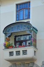 Balcony with glass window in Art Nouveau style in Burgstrasse