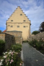 Old castle built 1512 with stepped gable