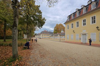Promenade with Comoedienhaus and former spa building in autumn
