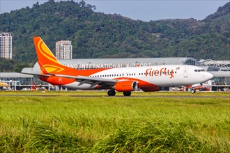A Firefly Boeing 737-800 aircraft with registration number 9M-MLF at Penang Airport