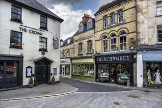 Picturesque townhouses with shop and pub in the old town of Cirencester