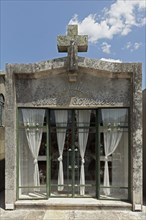 Mausoleum with curtains at the historic cemetery Cemiterio de Agramonte