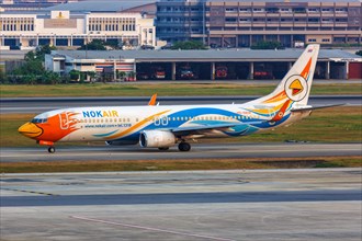 A Boeing 737-800 aircraft of NokAir with registration number HS-DBW at Bangkok Don Mueang Airport