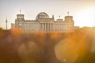 The sun rises behind the Reichstag. Berlin