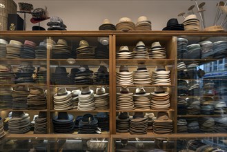Hats in display cases in a hat shop
