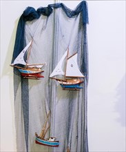 Set of small colorful model sailboats