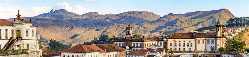Panoramic photograph of the historic city of Ouro Preto in Minas Gerais with its baroque churches and monuments and hills