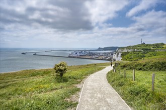 Footpath along the chalk cliffs of Dover with view to the ferry port