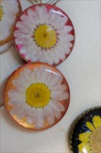 Pendant with beautiful dry flower inside resin