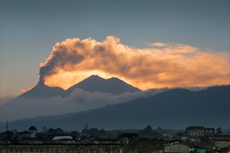 Fuego volcano with cloud of smoke and ash
