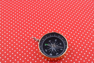Retro Compass on a red background