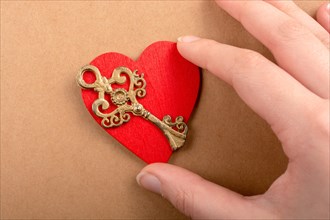 Retro styled decorative key and paper heart shape