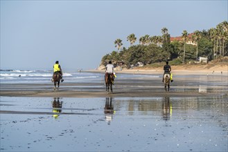 Riders on the beach of Fajara