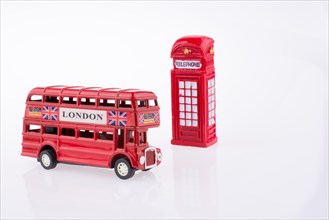 London Bus near a Telephone booth on a white background