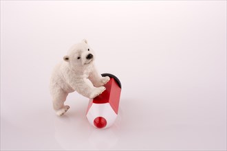 Polar bear on a red pen
