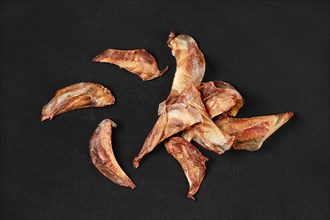 Top view of natural dried treats for dogs. Dried cartilage for dogs