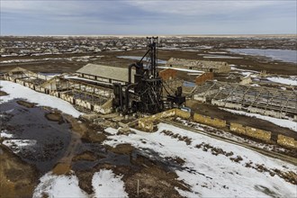 Aerial of an old wheat farm in the semi frozen earth