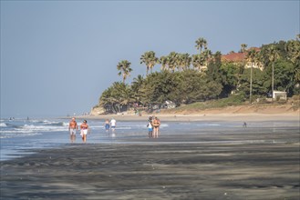 Tourists on the beach of Fajara