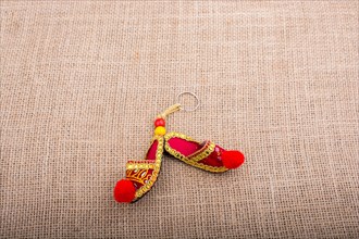 Traditional slippers on canvasvbackground
