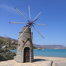 Windmill on the beach of Elounda