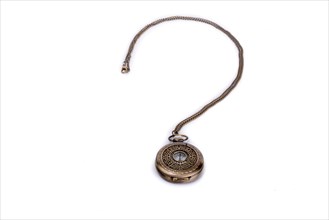 Pocket watch and its chain form a question mark on white background