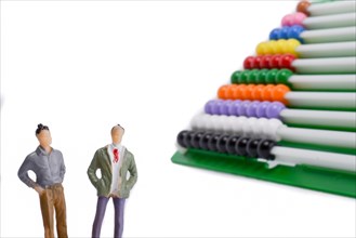 Two man standing by the colorful abacus on a white background