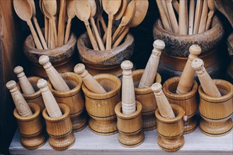 Wooden mortars and pestles as a traditional kitchenware