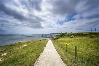 Footpath along the chalk cliffs of Dover with view to the ferry port
