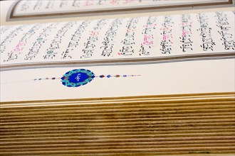 The Holy Quran on a white background